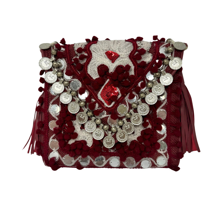 Shashi Coin and Pom Pom Crossbody Bag