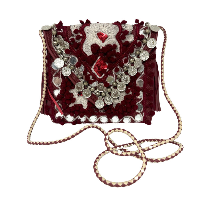 Shashi Coin and Pom Pom Crossbody Bag