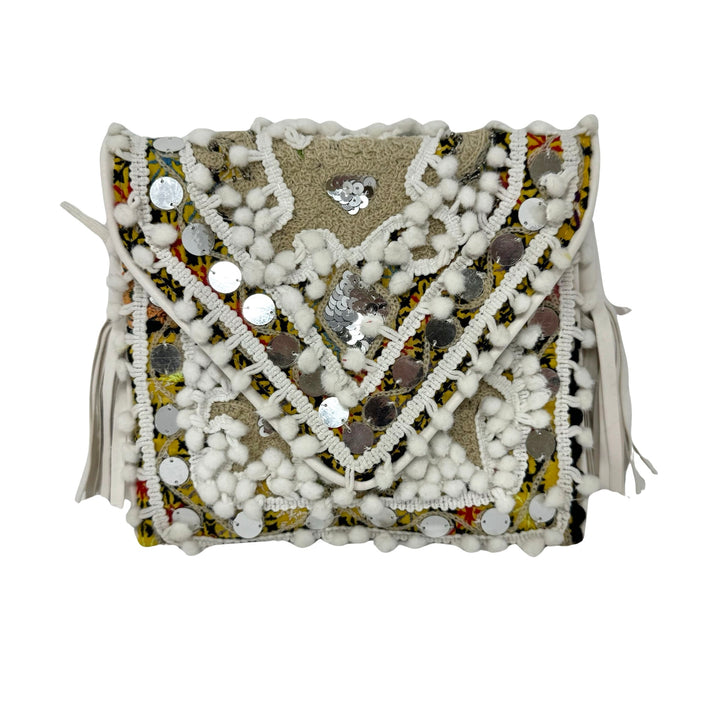 Shashi Small Metal Disc and Pom Pom Crossbody Bag