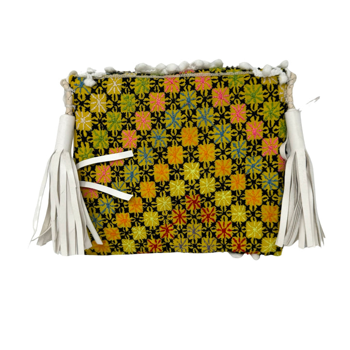 Shashi Small Metal Disc and Pom Pom Crossbody Bag